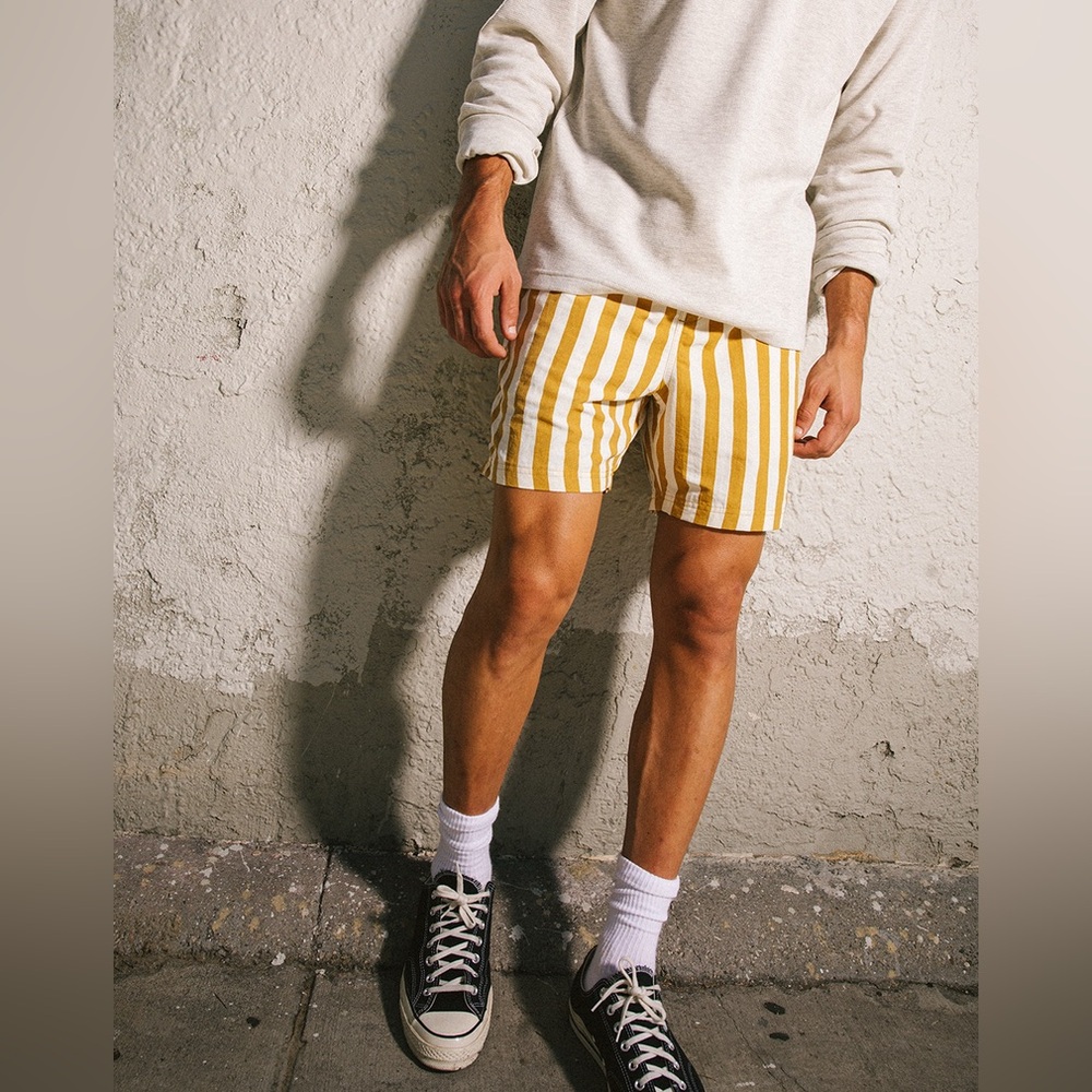 Tillys gold and white striped nylon shorts S